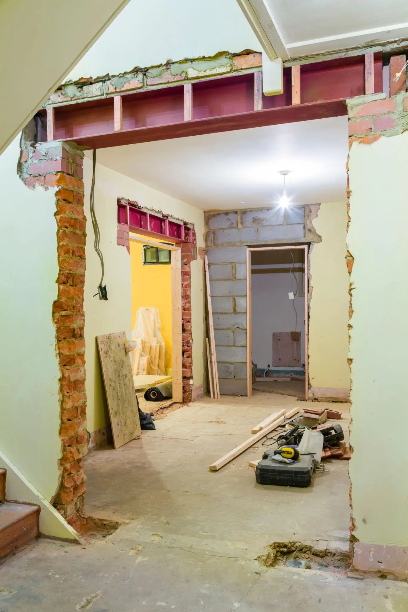 Steel RSJ beam installed over a doorway opening